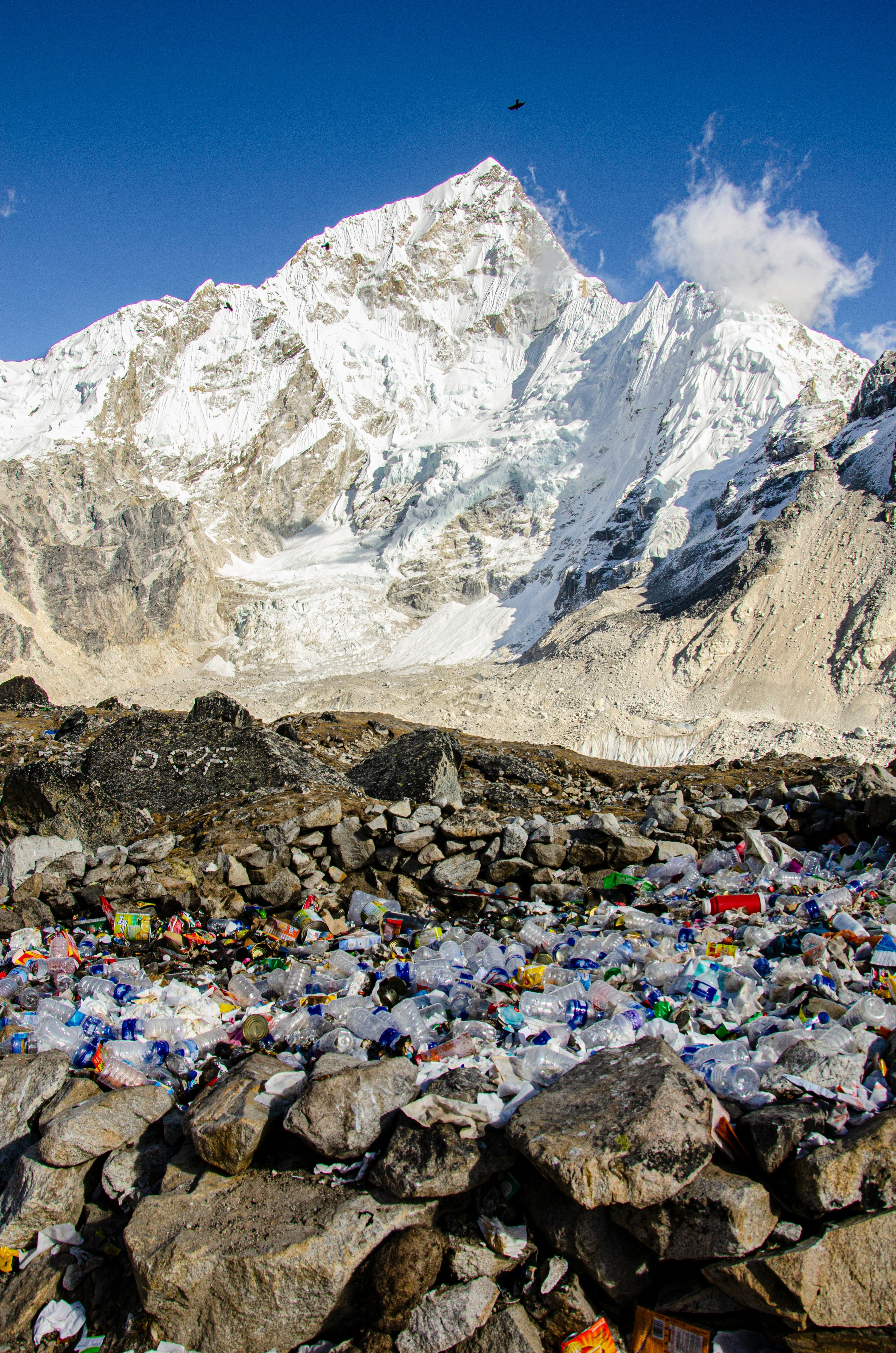 Mountain with plastic pollution underneath.